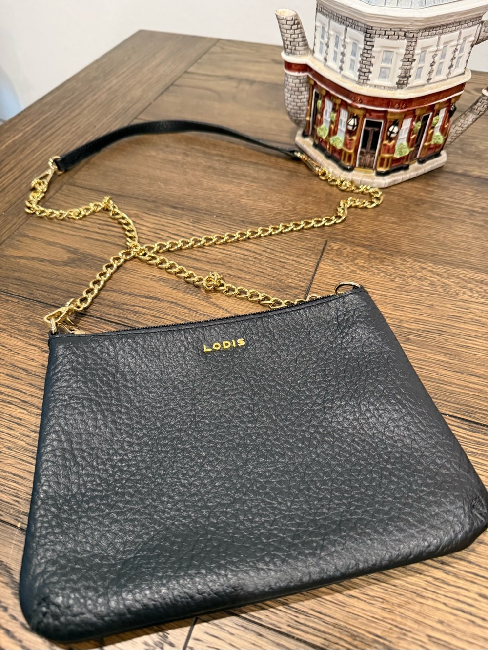 Lodis Black Leather Crossbody with Gold Chain Strap